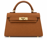 Bolso camel estructurado con asa superior y cierre girante dorado
